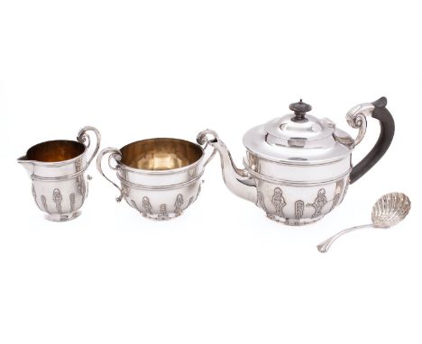 A Edward VII silver three piece silver tea service by Elkington & Co, London 1905, of circular form comprising tea pot, two h