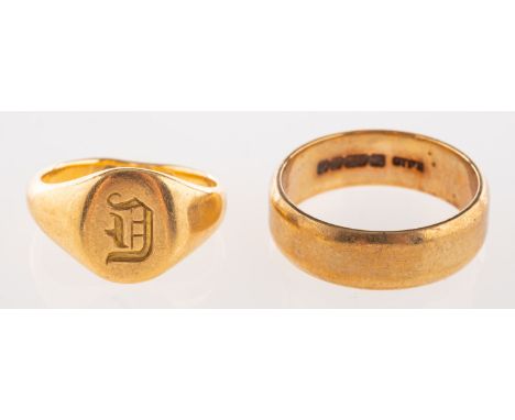A group of two gold rings, including an 18ct yellow gold signet ring with engraved initial, UK hallmark, size approx. E1/2 (s