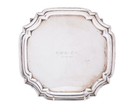 A George VI silver salver by S Blanckensee & Son Ltd, Birmingham 1941, of canted square form, raised on cabriole legs with sc