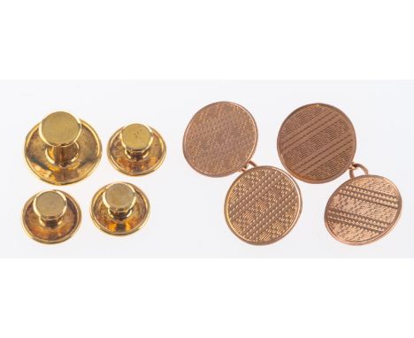 A group of two items of jewellery, including a pair of 9ct rose gold cufflinks, circular in design with engine turned decorat