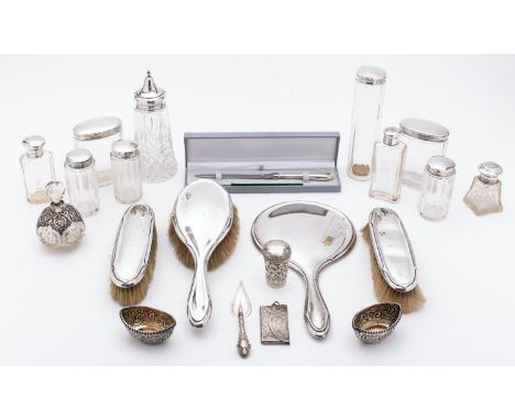 A mixed group of silver; including a long handle hair brush, a long handle hand-mirror, two clothes brushes, by Lionel Smith 