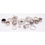 A mixed group of silver; including a Dutch silver miniature twin compartment picnic basket,