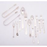 A mixed group of silver; including two pairs of sugar tongs, two tea spoons, two butter knives,