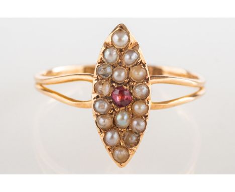 A 15ct gold Victorian ring, of navette form and set with a circular-cut ruby with a surround of seed pearls, split shoulders,