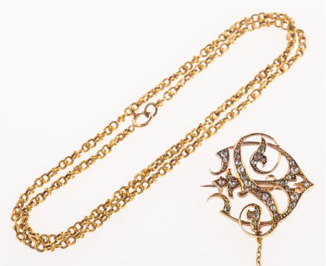 An antique brooch and chain, an antique monogram brooch depicting the entwined letters 'E' and 'S', set with rose-cut diamond