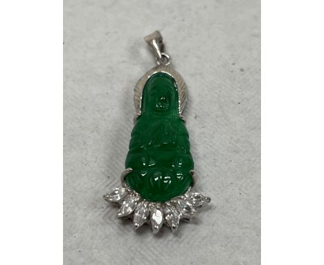A jade and white stone pendant.