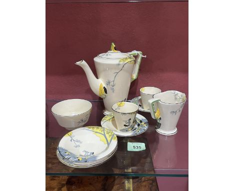 A 1930s Art-Deco Burleigh Ware 'Pan' Zenith shaped coffee service of ten pieces.