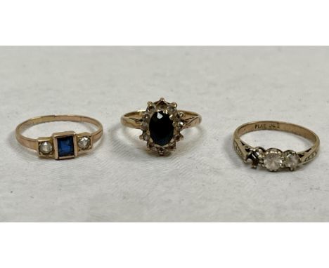 Two 9ct gemset rings, one with vacant setting and another ring.