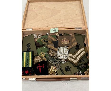 A collection of badges, epaulettes etc.