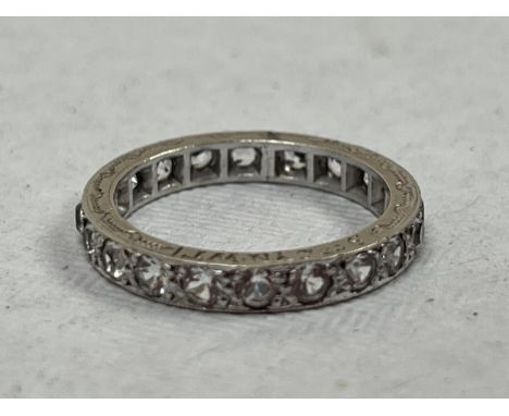 A diamond eternity ring. In gold marked 9ct, 2.6g gross. Size K.