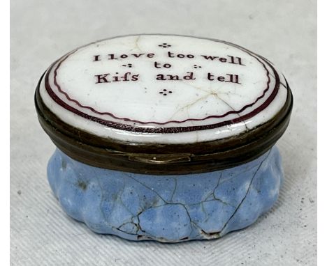 An 18th Century Bilston enamel patch box, the lid with inscription 'I Love Too Well to Kiss and Tell'.