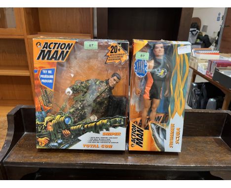Two boxed Action Man figures.
