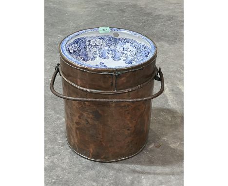 A Victorian R Wiss patent copper portable lavatory with blue and white ceramic liner. 15" high.