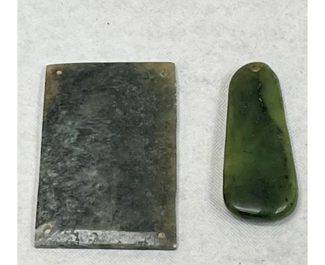 A Chinese Han dynasty jade platelet from a burial suit and an imperial jade pendant, the lot to include a volume, Princes of 