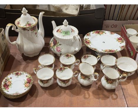 A Royal Albert 'Old Country Roses' pattern service of 18 pieces; a set of six Royal Worcester coffee cans and saucers and 18 