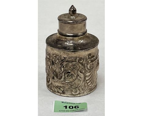 A Victorian silver tea caddy with repousse decoration. London 1898. 4" high. 3ozs.