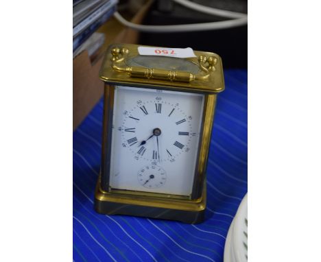 SMALL BRASS AND GLASS CARRIAGE CLOCK