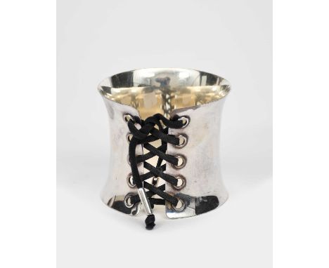 A Georg Jensen silver Corset cuff bangle, designed by Regitze Overgaard, waisted form with waxed string chord, stamped marks,