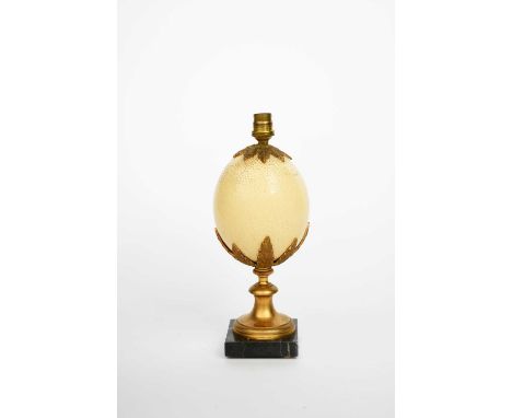 A Maison Jansen ostrich egg table lamp,  with gilt metal mounts on black veined marble base unsigned 31cm. high 