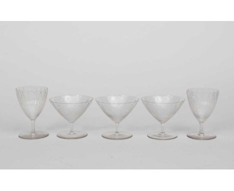 'Lotus' five Lalique clear glass table glasses designed by Rene Lalique, each modelled in low relief with lotus leaf design, 