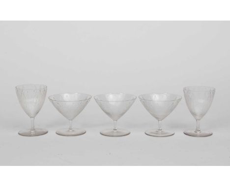 'Lotus' five Lalique clear glass table glasses designed by Rene Lalique, each modelled in low relief with lotus leaf design, 