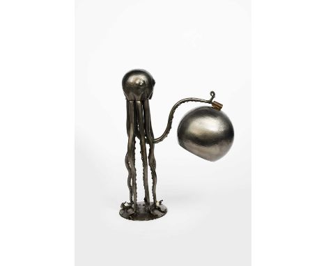 A patinated metal Octopus table lamp,  cast standing on seven tentacles, the eighth tentacle holding up the bowl shade, unmar