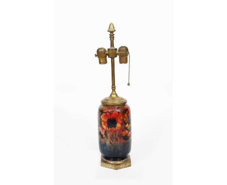 'Flambe Anemone' a Moorcroft Pottery lamp, shouldered cylindrical form, painted in colours under a rich flambe ground, with g