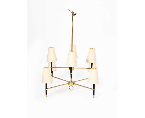 A large Italian brass and ebonised wood ceiling light, radiating arms supporting eight lights, the central rod with loop term