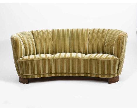 A Danish Art Deco sofa, kidney shaped sofa covered in a green striped velvet, unsigned, 173cm. wide, 71cm high, 71cm deep 