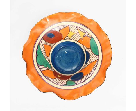 'Fruit' a Clarice Cliff Fantasque Bizarre bowl with fluted rim, painted in colours between orange and blue bands, printed fac