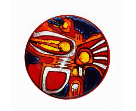 A Poole Pottery Delphis charger by Pamela Bevans,  painted with geometric abstract design in yellow, orange, blue and black o