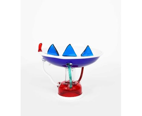 Φ A Memphis Milano Sol glass bowl designed by Ettore Sottsass, designed 1982, blue glass bowl on clear stem and red domed bas