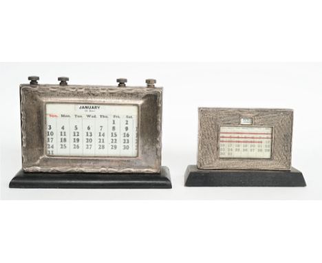 A silver mounted ebonised wooden cased adjustable desk calendar, Birmingham 1939 and another silver mounted smaller ebonised 