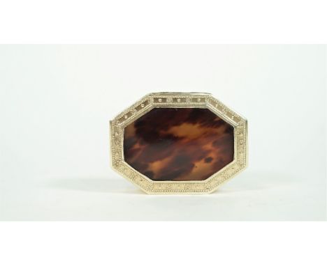 A French silver gilt and tortoiseshell box, of octagonal form, the hinged cover inset with a shell panel within a foliate bea