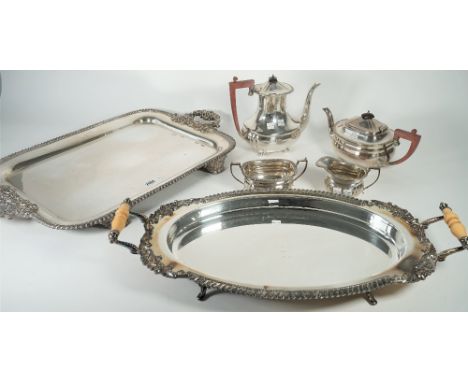 A group of plated wares, comprising; a rectangular large twin handled tray, decorated with a gadrooned rim, raised on four fe