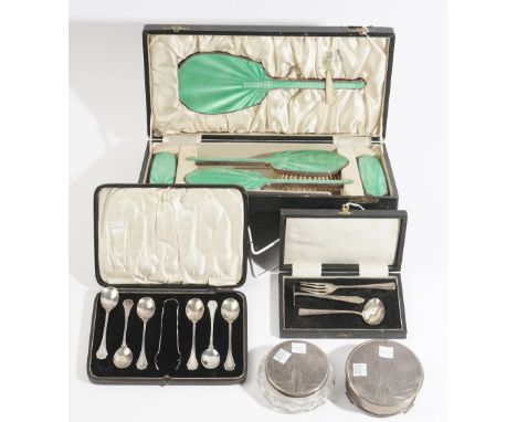 A lady's silver and green enamel mounted composite dressing set, comprising; two hairbrushes, two clothes brushes and a hand 