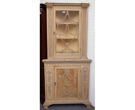 A late 19th century Neo-classical revival floor standing painted corner display cabinet cupboard, the single glazed door over