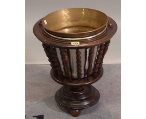 A 19th century stained beech slatted jardiniere stand, on bobbin turned supports, 35cm wide x 40cm high. 