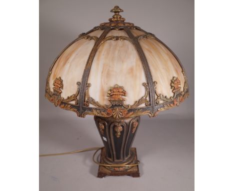 A Tiffany style composite metal lamp of urn form, and matching glass shades. 