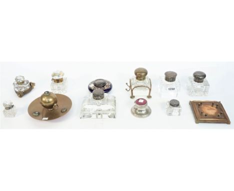 Eleven inkwells, including; a square glass inkwell with silver mounts, the hinged lid enclosing a small clock, 9cm high, thre