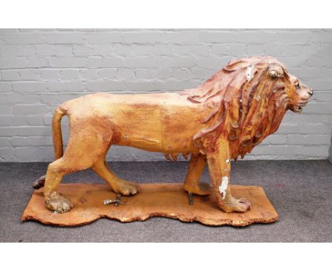 A composite figure of a lion, early 20th century, possibly, formerly a German automaton model, polychrome painted on a wooden