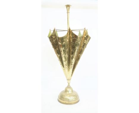 An early 20th century sheet brass stick/umbrella stand, formed as an up-turned umbrella, with foliate embossed decoration and