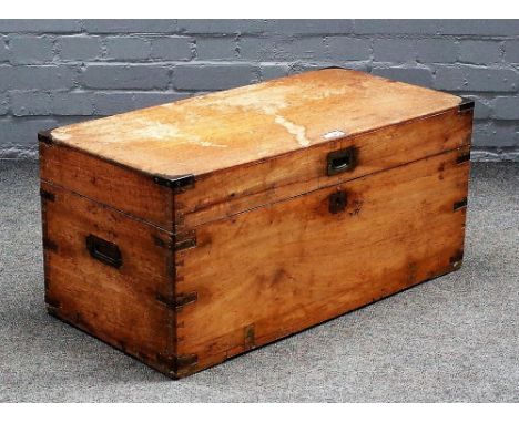A 19th century brass bound, bleached mahogany, rectangular lift top travelling trunk, 84cm wide x 40cm high.