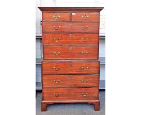 A George III mahogany chest on chest of three short over six long graduated drawers, on bracket feet, 106cm wide x 177cm high
