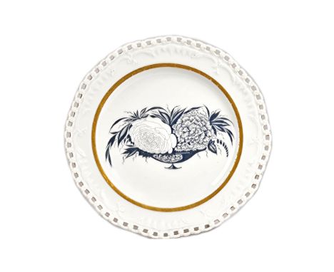A Soviet porcelain plate from the `Rose and Carnation' service, State Porcelain Manufactory, dated 1922, the centre painted i
