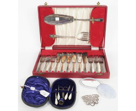 A set of six pairs of plated fish knives and forks and a pair of matching fish servers, cased, an oval pale mauve stained har
