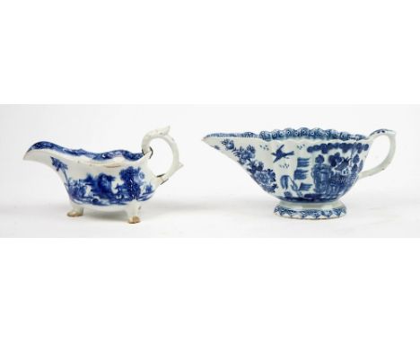 Two Bow blue and white sauceboats, the first, circa 1754, of silver form painted with the `desirable residence' pattern, 17.5