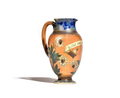 A Martin Brothers stoneware jug, dated 1882, incised with white dahlias around a scroll inscribed `Love Makes One Fit For Any