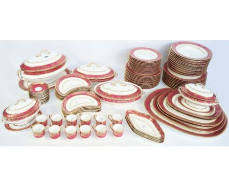 An extensive Mintons bone china part dinner service, 20th century, decorated in the `Grasmere Crimson' pattern, comprising; a