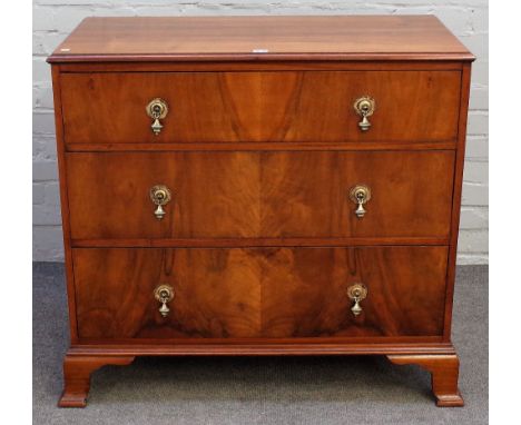 Waring &amp; Gillow Limited; a walnut chest with three long graduated drawers, on ogee bracket feet, 92cm wide x 85cm high.